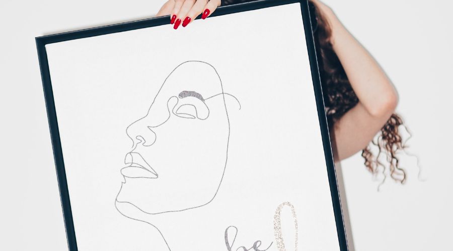 A poster with a line drawn face