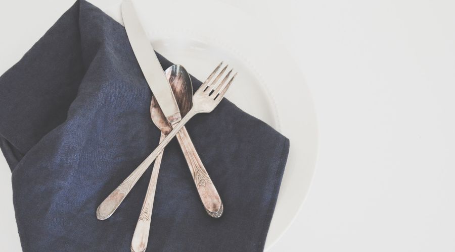 Cutlery laid on a napkin